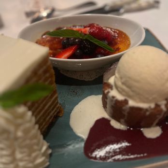Ocean Prime - Left - Ten layer carrot cake Middle - Crème brûlée Right - Warm butter cake - Seafood Near Me - Chicago, Illinois Ocean Prime - Left - Ten layer carrot cake Middle - Crème brûlée Right - Warm butter cake - Seafood Near Me - Chicago, Illinois