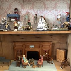 The Miniature Cellar - Hand sculpted and dress dolls by miniature artisans and a living room scene.