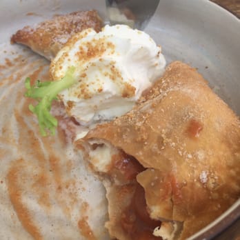 Doce Provisions - Half eaten guava con queso empanadas only because I couldn't wait to take the picture! Soo good - New American Near Me - Miami, Florida Doce Provisions - Half eaten guava con queso empanadas only because I couldn't wait to take the picture! Soo good - New American Near Me - Miami, Florida