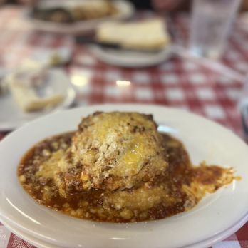 Luigi's - a plate of lasagna on a table - Italian Near Me - Bakersfield, California Luigi's - a plate of lasagna on a table - Italian Near Me - Bakersfield, California
