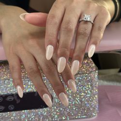 OC Nails Studio - Beautiful pearl nude almond nails -- a timeless and elegant look at OC Nails Studio.