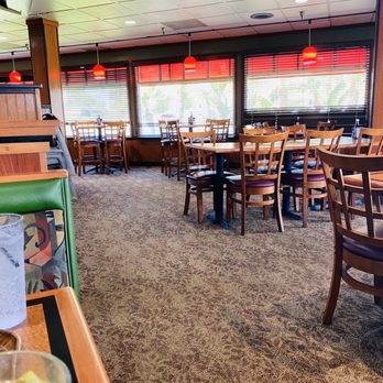 Sizzler - tables and chairs in a restaurant - Seafood Near Me - Torrance, California Sizzler - tables and chairs in a restaurant - Seafood Near Me - Torrance, California