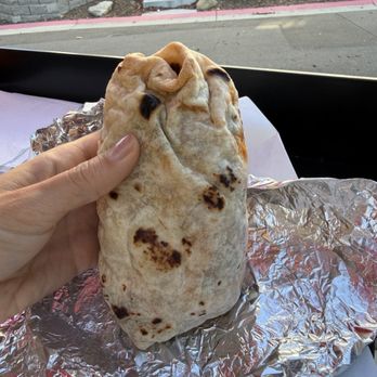 Grindz Coffee Shop - Chorizo burrito which includes scrambled eggs and potatoes. Comes with side of mild salsa - Coffee & Tea Near Me - Garden City, Idaho Grindz Coffee Shop - Chorizo burrito which includes scrambled eggs and potatoes. Comes with side of mild salsa - Coffee & Tea Near Me - Garden City, Idaho