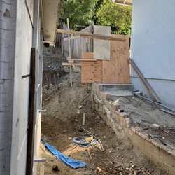 Green Vision - Mangled and uncapped rebar, broken fence, violated neighbor's property line