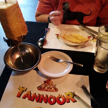 Tannoor Grill - Great fresh salad, baba ganoush,  humus,  pita,  meatballs, sirloin, chicken legs & breast, and this smokin' sweet pineapple. - Mediterranean Near Me - Memphis, Tennessee