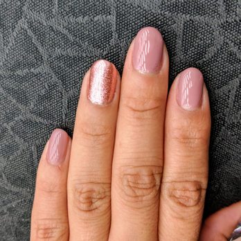 L Beauty  - Gel manicure. Was not impressed. Nails were filed too short and the nail polish is on my cuticle. Nail polish is uneven. - Nail Salons Near Me - Pasadena, California