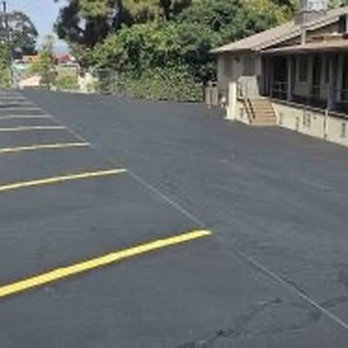 Jimenez Paving - Cracks filled and the lot sealed and new striping. - General Contractors Near Me