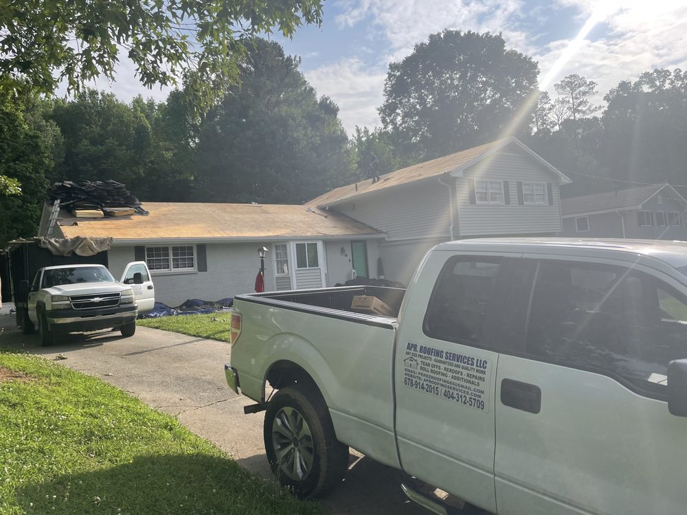 Slide of APR Roofing Service