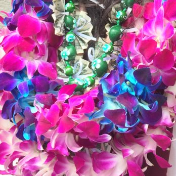 Lester's Flower Shop - Double orchid lei with blue dyed flowers - Floral Designers Near Me - Colma, California Lester's Flower Shop - Double orchid lei with blue dyed flowers - Floral Designers Near Me - Colma, California