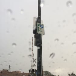 REI - Yup pay to park sign outside REI is about 12' up...the violation is $35!
