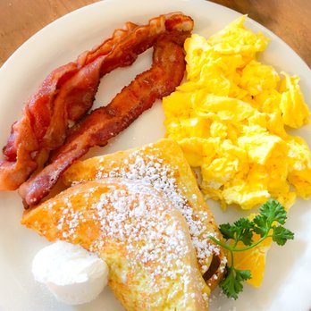Moke’s Bread And Breakfast - #3 One Slice of French Toast, Two Eggs, and Bacon, Ham or Sausage - Breakfast & Brunch Near Me - Honolulu, Hawaii Moke’s Bread And Breakfast - #3 One Slice of French Toast, Two Eggs, and Bacon, Ham or Sausage - Breakfast & Brunch Near Me - Honolulu, Hawaii