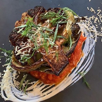 Sidecar - Baked cauliflower - on a bed of marinara sauce with Parmesan cheese! - New American Near Me - San Luis Obispo, California Sidecar - Baked cauliflower - on a bed of marinara sauce with Parmesan cheese! - New American Near Me - San Luis Obispo, California