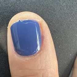 NB Quarry Nails - Uneven polish application, polish smeared and left in cuticle and tip of thumb.
