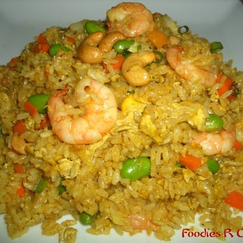 Chef Yu - Pineapply fried rice with cashew nuts and shrimps - Szechuan Near Me - New York, New York Chef Yu - Pineapply fried rice with cashew nuts and shrimps - Szechuan Near Me - New York, New York