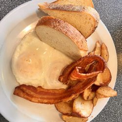 Toast - 2 Side of Two-Eggs, bacon, Home Fries, and sourdough.