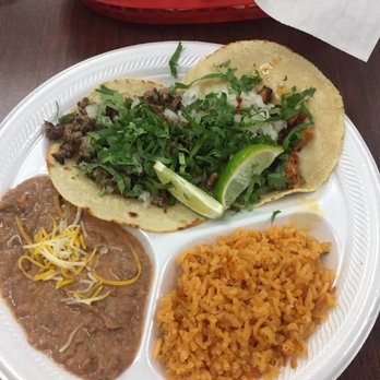 Taco Jalisco - Pastor and carne asada tacos with Spanish rice and refríed beans. - Mexican Near Me - Sarasota, Florida Taco Jalisco - Pastor and carne asada tacos with Spanish rice and refríed beans. - Mexican Near Me - Sarasota, Florida