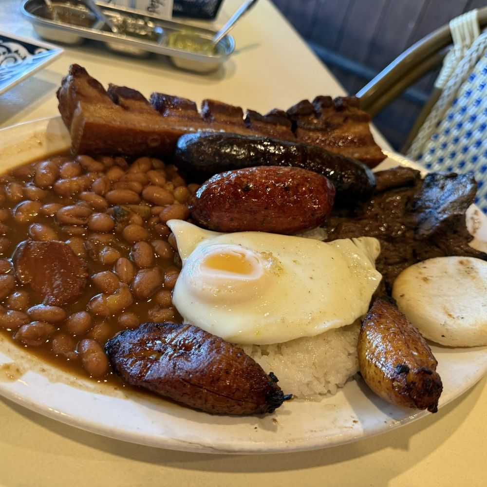 Bandeja paisa with carne asada. Bandeja paisa with carne asada.