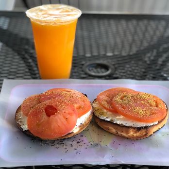 5th Ave Bagelry - Poppy Seed Bagel topped with Cream Cheese and Tomatoes  and a small Fresh Orange Juice - Bagels Near Me - Buena Park, California