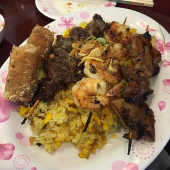 Saigon Noodle House - Beef, shrimp, chicken skewer with crispy spring roll on substituted egg fried rice - Vietnamese Near Me - Crofton, Maryland Saigon Noodle House - Beef, shrimp, chicken skewer with crispy spring roll on substituted egg fried rice - Vietnamese Near Me - Crofton, Maryland
