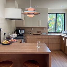 Gut reno 1957 mid-century kitchen. New full height windows, skylight, custom cabinetry, refinished flooring. New electrical for entire room. Gut reno 1957 mid-century kitchen. New full height windows, skylight, custom cabinetry, refinished flooring. New electrical for entire room.