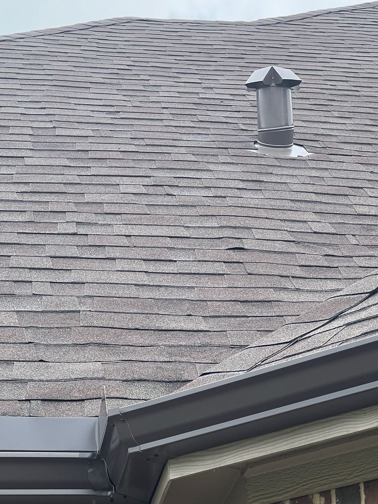 Slide of Tucker Roofing Systems