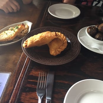Santiago's Bodega - Amazing empanadas! Accompanied by Thai meatballs and shrimp scampi...$5 happy hour tapas. Yum! - Tapas Bars Near Me - Key West, Florida Santiago's Bodega - Amazing empanadas! Accompanied by Thai meatballs and shrimp scampi...$5 happy hour tapas. Yum! - Tapas Bars Near Me - Key West, Florida