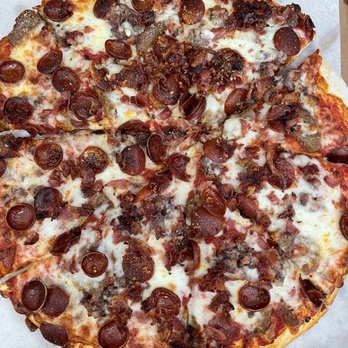 Casa Italiana - A large meat lover's! This thing was PACKED with toppings. - Delis Near Me - Canandaigua, New York