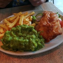 Kitchen 50 Six - Hand battered cod with peas and chips.