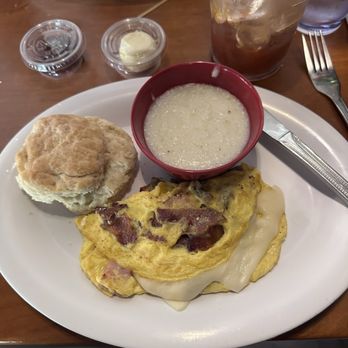 Ruby Sunshine Knoxville - Three Little Pigs Omelet with grits and biscuit! - Breakfast & Brunch Near Me - Knoxville, Tennessee Ruby Sunshine Knoxville - Three Little Pigs Omelet with grits and biscuit! - Breakfast & Brunch Near Me - Knoxville, Tennessee