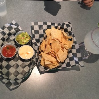Pelon's Baja Grill - Chips and dip trio and the fresh margarita. - Mexican Near Me - Norfolk, Virginia Pelon's Baja Grill - Chips and dip trio and the fresh margarita. - Mexican Near Me - Norfolk, Virginia