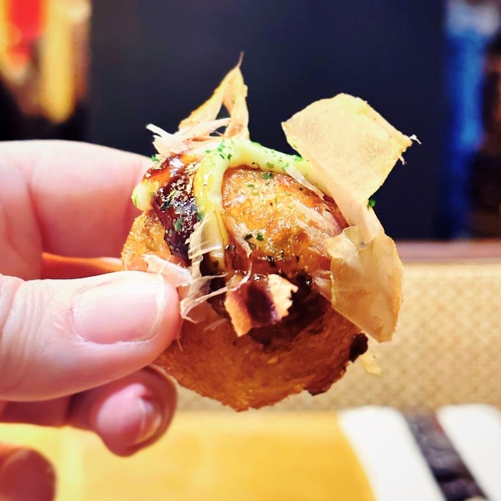 Zundo Ramen & Donburi - Tako Yaki - fried wheat flour octopus balls with sauces and fish flakes on top. - Bars Near Me - Jackson, Mississippi Zundo Ramen & Donburi - Tako Yaki - fried wheat flour octopus balls with sauces and fish flakes on top. - Bars Near Me - Jackson, Mississippi