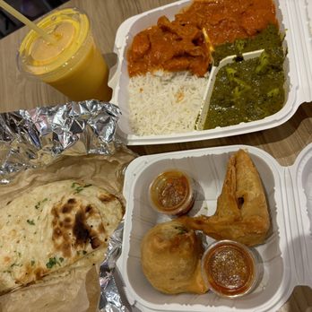 Lasoon - Garlic naan bread, samosas, mini plate with butter chicken, Basmati rice and palak paneer and Mango Lassi - Himalayan/Nepalese Near Me - Aiea, Hawaii Lasoon - Garlic naan bread, samosas, mini plate with butter chicken, Basmati rice and palak paneer and Mango Lassi - Himalayan/Nepalese Near Me - Aiea, Hawaii