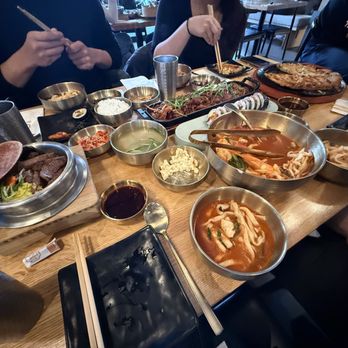 Ondam - Full table - Stir-Fried Spicy Pork ($29.99) pictured in the middle) - Korean Near Me - Santa Clara, California Ondam - Full table - Stir-Fried Spicy Pork ($29.99) pictured in the middle) - Korean Near Me - Santa Clara, California