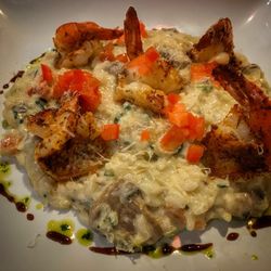 Rizo’s Cuisine - SHRIMP TRUFFLE CREAM MUSHROOM RISOTTO  Shrimp, Risotto, Truffle Cream, Onion, Mushrooms, Roma Tomatoes, Spinach, Cajun Oil