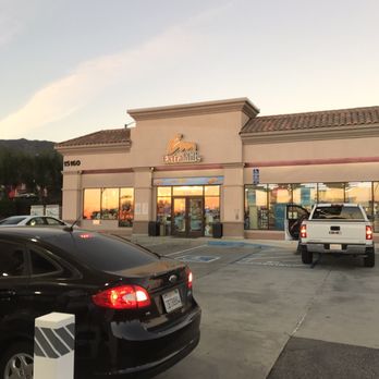 Chevron - a black car parked in front of a store - Gas Stations Near Me - Fontana, California Chevron - a black car parked in front of a store - Gas Stations Near Me - Fontana, California