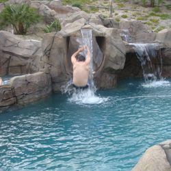 Daredevil going down the slide backwards
