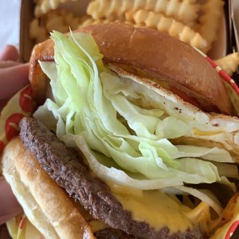 Pool Burger - Double Pool Cheeseburger with fried egg, crinkle cut fries - Tiki Bars Near Me - Austin, Texas Pool Burger - Double Pool Cheeseburger with fried egg, crinkle cut fries - Tiki Bars Near Me - Austin, Texas