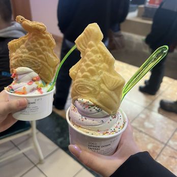 Softer - a person holding a cup of ice cream and a waffle cone - Ice Cream & Frozen Yogurt Near Me - Anchorage, Alaska
