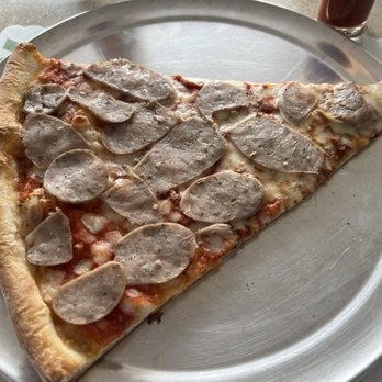 Goodfella’s Pizza - Slice of sausage delicious - Pizza Near Me - Sebastian, Florida