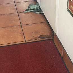 Dirty towel sitting on the floor Dirty towel sitting on the floor