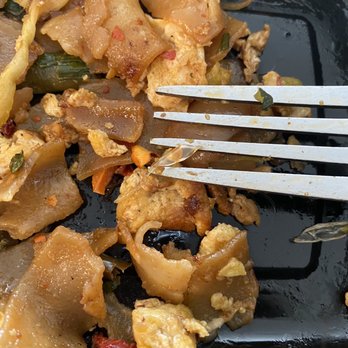La Moon Thai Eatery - a plate of food with a fork - Thai Near Me - San Diego, California