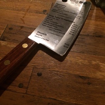 Cork 'n Cleaver - The menu is on a very heavy butcher knife. A very original and cute idea. - Steakhouses Near Me - Evansville, Indiana