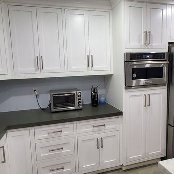 Elite Custom Cabinets - kitchen with stainless steel appliances - General Contractors Near Me - Hemet, California Elite Custom Cabinets - kitchen with stainless steel appliances - General Contractors Near Me - Hemet, California