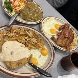 Smothered burrito! Mega breakfast which include pancakes not in photo! And my country style steak as big as my head! So good!