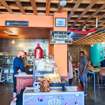 Flying Squirrel Coffee Co - customers at the counter - Coffee & Tea Near Me - Mansfield, Texas Flying Squirrel Coffee Co - customers at the counter - Coffee & Tea Near Me - Mansfield, Texas