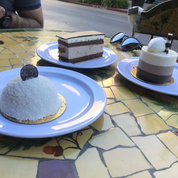 Cacoco - two desserts on plates on a table - Chocolatiers & Shops Near Me - Oakland, California Cacoco - two desserts on plates on a table - Chocolatiers & Shops Near Me - Oakland, California