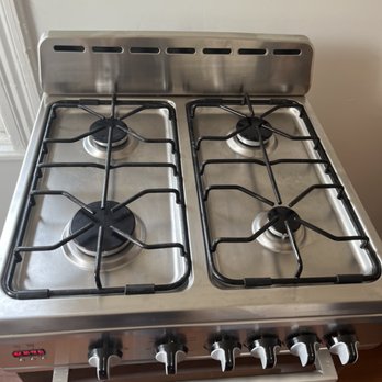 Elite Cleaning Helpers - Appliance cleaning After picture of stove top - Office Cleaning Near Me - Buffalo, New York