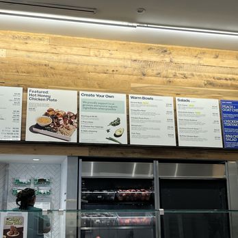 sweetgreen - Healthy Salads, Wraps, and Bowls - menus on a wooden wall - Salad Near Me - Chicago, Illinois