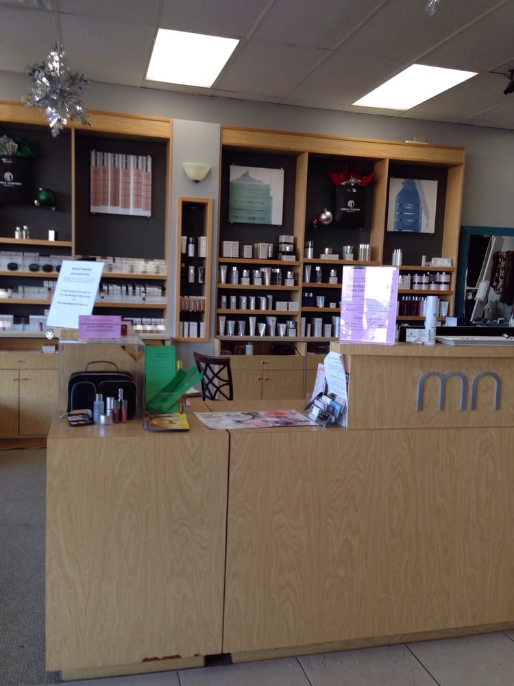 Merle Norman Cosmetics & Salon Logo