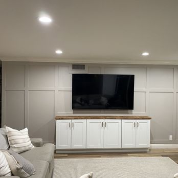 Galindo Crown - Beautiful accent wall built with cabinets butcher block stained , tv mounted . And wall color matched n painted . - Handyman Near Me